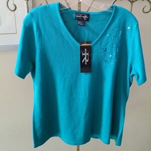 Short sleeve teal acrylic sweater. NWT